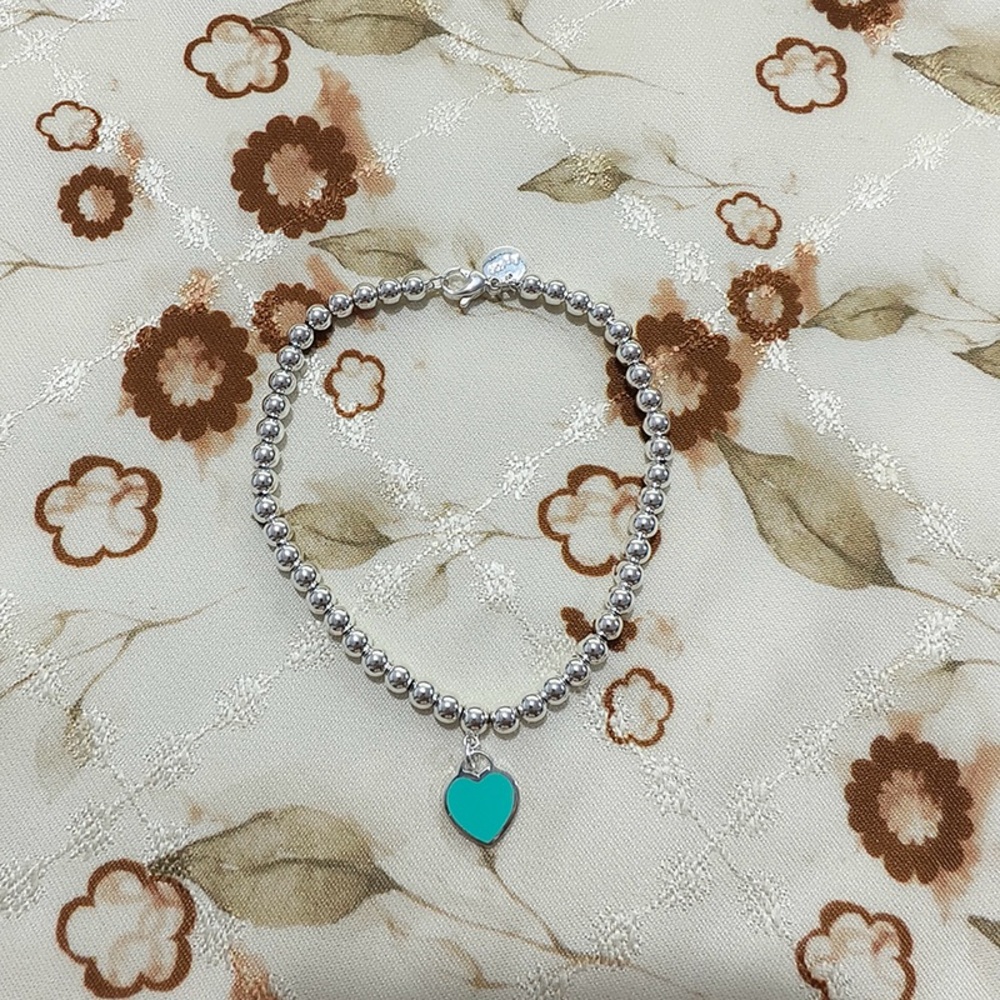 Tiffany & Co. Silver And Green Heart Bracelet